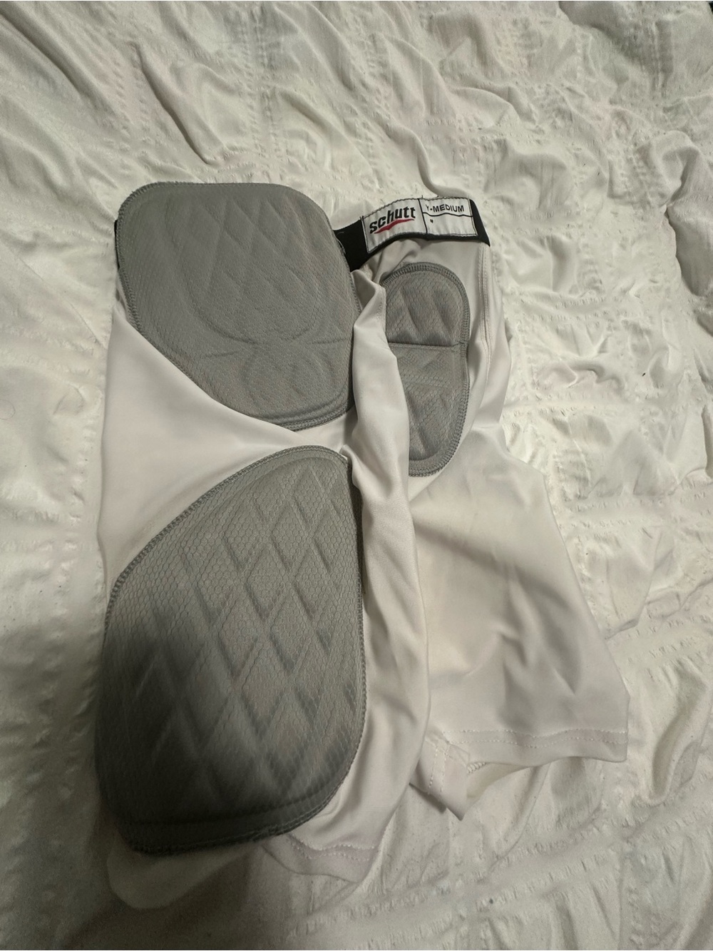 Youth White Compression Shorts with Gray Protective Pads